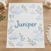 Juniper Cloud Garden Personalized Baby Blanket — main illustrative mockup