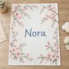 Nora Orchard Blossom Personalized Baby Blanket — main illustrative mockup